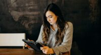 Woman reading bitcoin crypto newsletter containing trading market news analysis