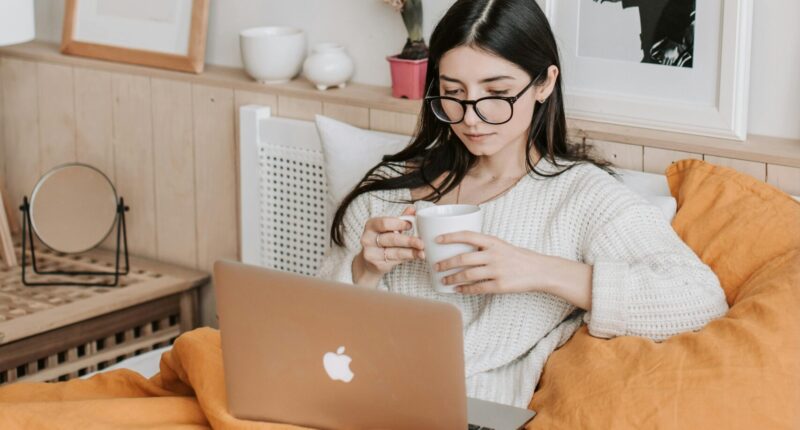 woman watching bitcoin ethereum crypto news and trading tips price analysis on tablet